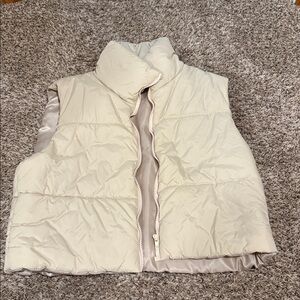 Cream Puffer Vest. Size large.